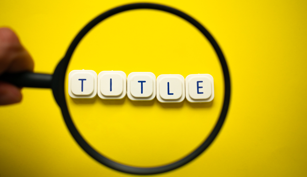 A,Magnifying,Glass,Looking,To,The,Word,"title",Made,With